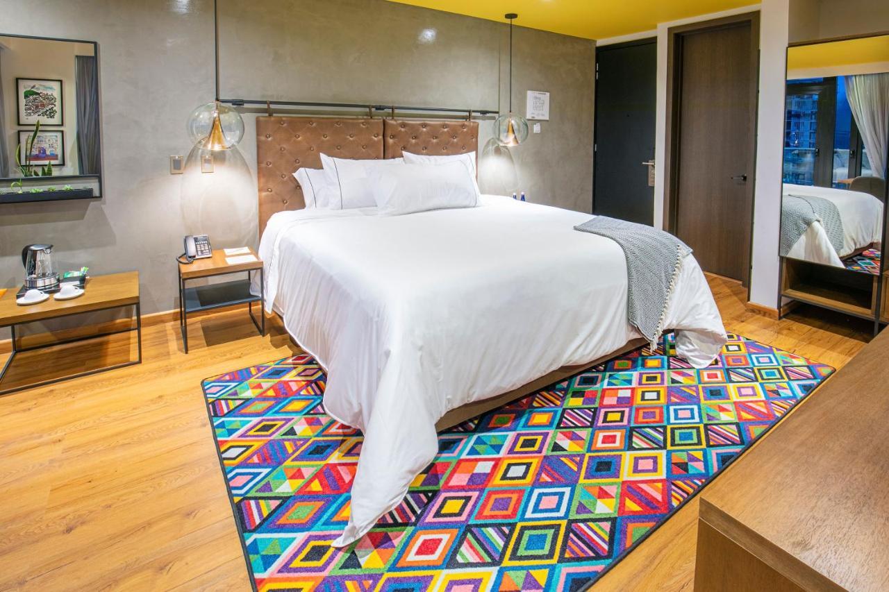 Hotel V1501 Пасто Екстериор снимка A carpet in a bedroom